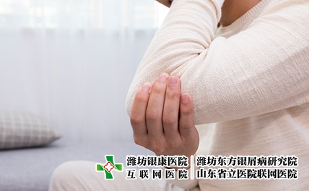 攝圖網(wǎng)_500708291_生病的年輕人胳膊疼（企業(yè)商用）關(guān)節(jié)