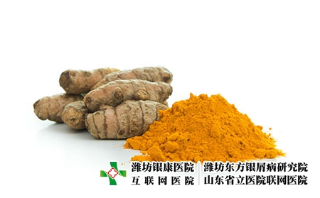 攝圖網_503641087_一堆姜黃粉與新鮮姜黃根（企業商用）